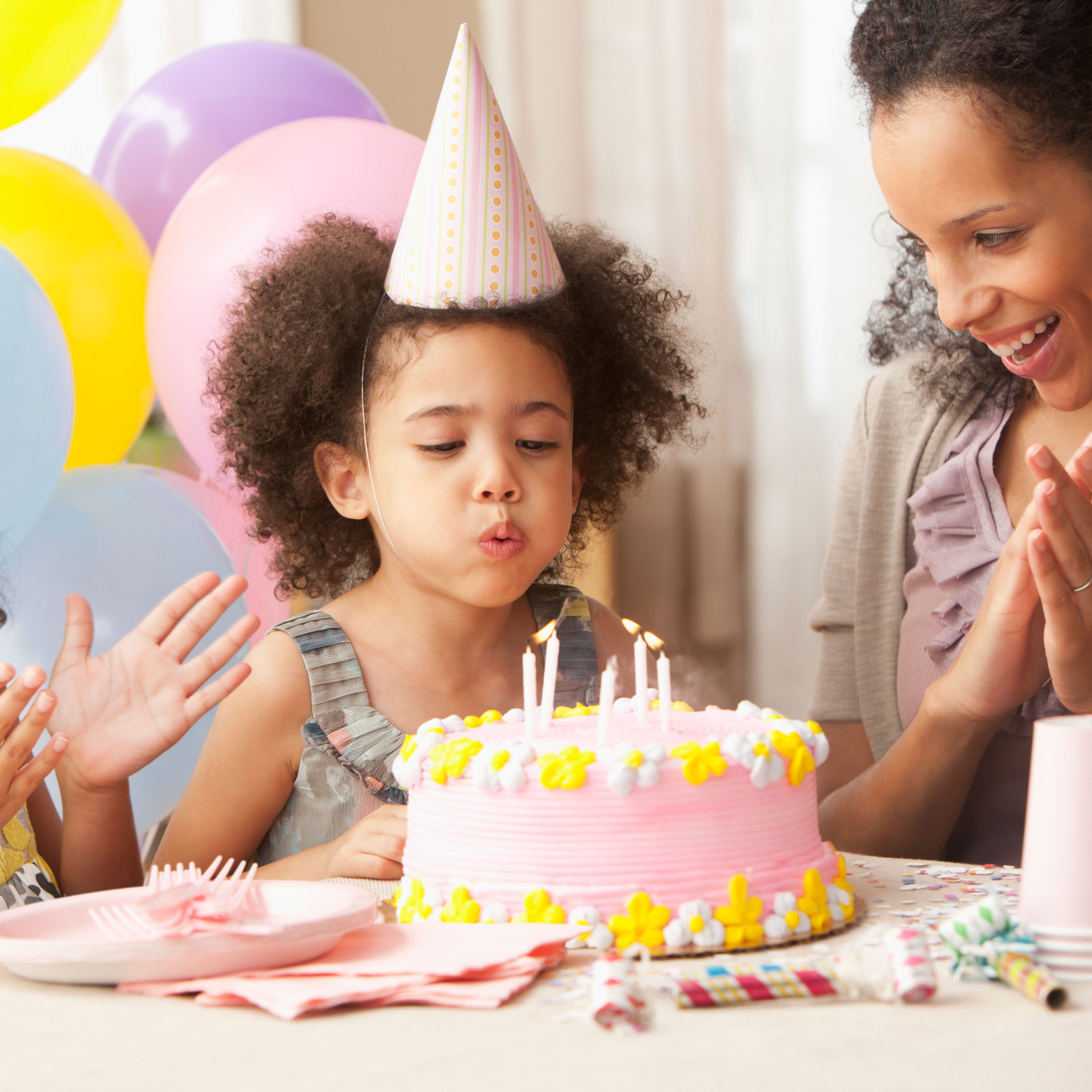 A classroom party table with wrapped treats
